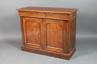 A Victorian mahogany chiffonier fitted 1 long drawer above double cupboards enclosed by panelled doors, raised on a platform base 35"h x 43 1/2"w x 18 1/2"d
