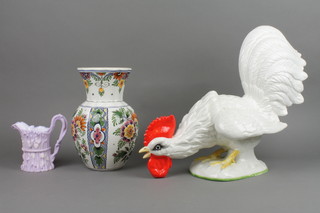 A Continental figure of a cockerel 14", a Delft oviform vase and a Victorian jug 