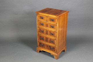 A Georgian style yew chest with crossbanded top fitted 2 short and 4 long drawers on bracket feet 32"h x 18 1/2"w x 15"d 