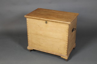 A rectangular Victorian pine box with hinged lid, on bracket feet 26"h x 29"w x 18"d 