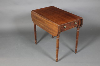 A Victorian mahogany Pembroke table fitted a drawer, raised on turned supports 26"h x 32 1/2" x 40"