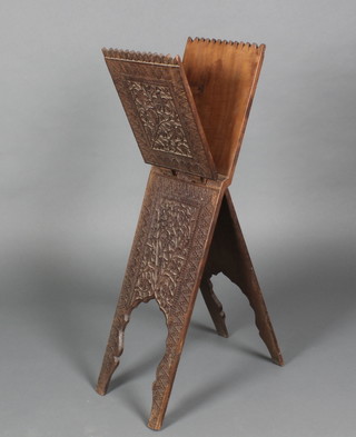 A carved hardwood Koran stand 22 1/2"h x 20"w x 10"