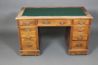 A Victorian mahogany desk with inset green skiver above 1 long and 6 short drawers 27"h x 48"w x 25 1/2"d