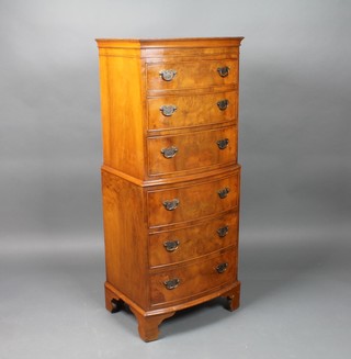 A Georgian style walnut miniature bow front chest of 6 long drawers with moulded cornice, raised on bracket feet 52"h x 21 1/2"w x 16"d