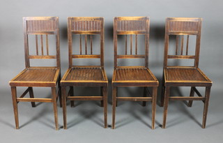 A set of 4 beech framed Liberty style stick and bar back dining chairs with solid seats on square tapering supports