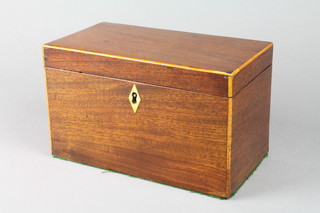 A 19th Century rectangular mahogany twin compartment tea caddy with satinwood crossbanding, ivory escutcheon and hinged lid 5"h x 7 1/2"w x 4 1/2"d 