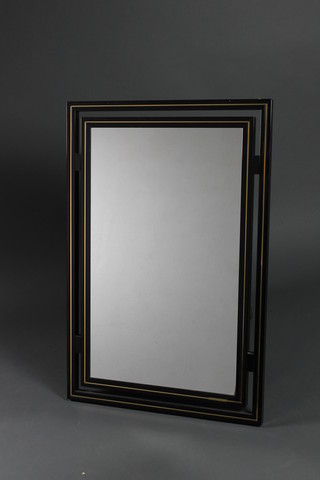 Pierre Vandel Paris, a rectangular plate mirror contained in a black tubular metal frame 35" x 33 1/2" 