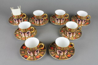 A set of 8 Royal Crown Derby Japan pattern coffee cans and saucers