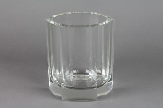 A hexagonal clear glass vase 6"