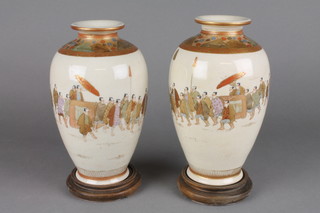 A pair of 19th Century Satsuma over form vases decorated with a procession of figures with seal mark to base 7" 