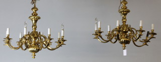 A pair of 18th Century Dutch style 8 branch electroliers with reeded baluster stems, scrolled branches and dish sconces, 28"h x 31 1/2" diam. 