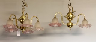 A gilt metal 5 light electrolier with pink glass shades and a 2 branch gilt metal electrolier 