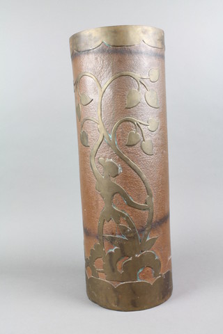 A cylindrical copper and brass stick stand decorated stylised figure 22"h 