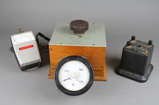 A reversing switch box type 4293E by H Tinsley together with a plastic cased meter by Metrohm with circular dial calibrated 0-600 4 1/" and 1 other item 