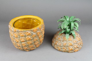 A 1960's ice bucket in the form of a pineapple complete with glass liner 11"