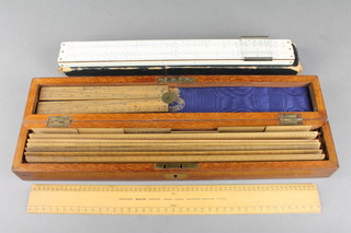 4 Negretti and Zambra Engine divider rulers, an Army & Navy CSL Engine divider ruler, a W Newman & Co Calcutta ruler, a Stanley Engine divided scale, a folding gauge, 6 2" rules marked feet and a slide rule 