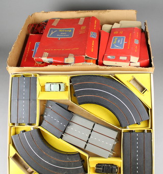 A Triang Minic motorway set boxed and various items of Triang Minic motorway accessories, boxed