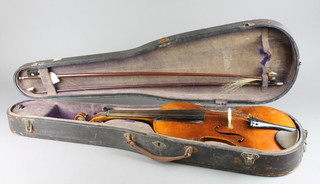 A violin with 2 piece back marked Hopf 14 1/2" together with 2 bows and with carrying case