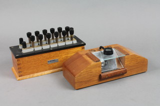 A WBE resistor box 9" and a specimen microscope 10" 
