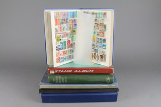 A Collector's Range blue loose leaf album of stamps, an Errimar green album of stamps and 4 stock books