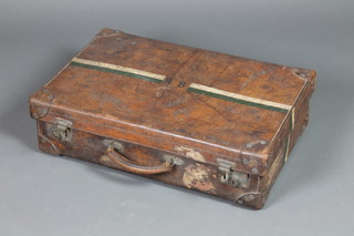 A brown leather suitcase with brass mounts by The Army & Navy Co-Operative Society Ltd 6 1/2"h x 24"w x 15 1/2"d 