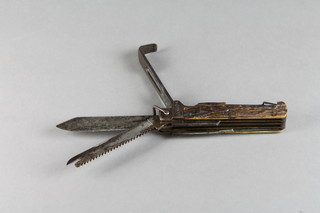 A good quality 19th Century folding jack knife with 3 blades - 1f, a pair of scissors, bodkin, corkscrew and punch, the side fitted a needle and a pair of tweezers 6" 