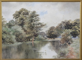 An Edwardian watercolour drawing, Dutch study of a river landscape with distant buildings 8" x 11" 
