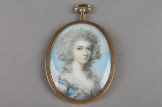 An 18th Century miniature oval portrait of a young lady in a blue dress with a white lace trim 2.5" x 2", contained in a gilt frame 