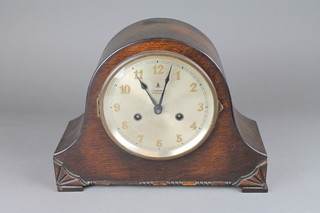 Gustav Becker, a striking mantel clock with silvered dial and Arabic numerals contained in an oak Admiral's hat shaped case, retailed by J Purser Ltd