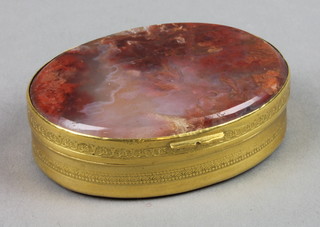 A fine early 19th Century Continental gold agate mounted oval snuff box with formal floral decoration. 2.5"