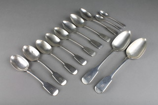 A pair of George III silver fiddle pattern table spoons, London 1827 and 10 other spoons, 15 ozs
