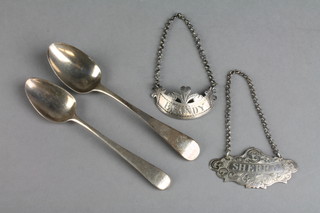 A Georgian pierced and chased silver brandy label, 2 teaspoons and a sherry label 