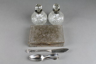 A Sterling silver butter knife, a silver christening spoon, 2 silver mounted toilet bottles and a plated box