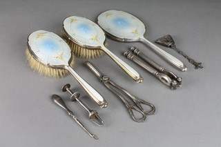 A silver and guilloche enamel 3 piece brush set (f), a Continental sugar spoon and minor items