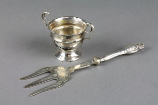 A silver 2 handled trophy cup 1.5" and a pickle fork