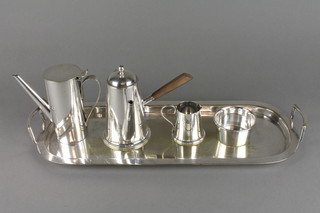 A silver plated 2 handled tray and a 4 piece bachelor's tea and coffee set