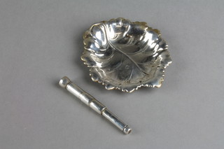 A repousse silver leaf shaped dish 3" and a ditto cigar piercer 