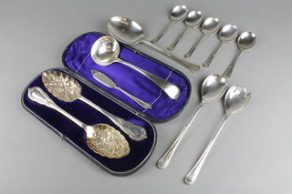 A pair of silver plated coast berry spoons and other minor spoons