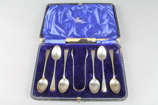 A cased set of 6 silver coffee spoons and nips, Sheffield 1903