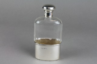 A cut glass silver mounted spirit flask with cup base, London 1913, 5.5"