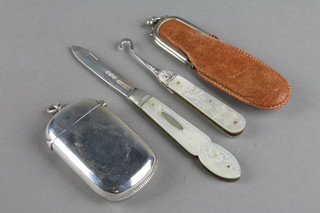 A silver vesta case of plain form, a silver plated and mother of pearl fruit knife and a ditto button hook
