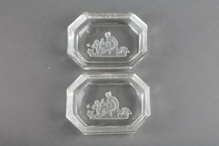 A pair of Baccarat crystal octagonal dishes decorated with classical figures 2.5" 