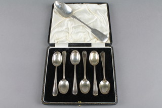 A set of 6 silver cased beaded teaspoons, London 1932, a silver dessert spoon