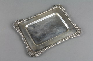 An Edwardian silver rounded rectangular tray with gadroon and shell rim, Sheffield 1900 5.5", 5 ozs