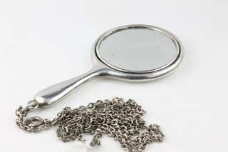 A silver miniature hand mirror pendant on a ditto chain
