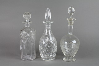 A cut glass cylindrical decanter and stopper 11", 2 mallet shaped ditto
