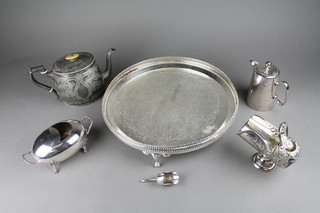 An ovoid silver plated spoon warmer on claw and ball feet 7", a plated tray and 3 other items