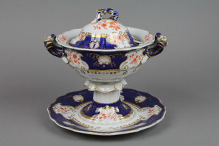 A 19th Century ironstone tureen and cover with Japanned style decoration 8"