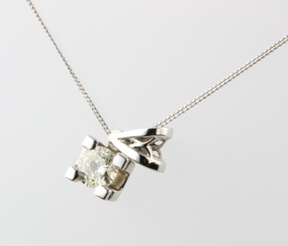 An 18ct white gold single stone diamond pendant, approx 0.24ct on a 9ct white gold chain