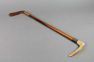 A hunting crop with stag horn handle and plated mount